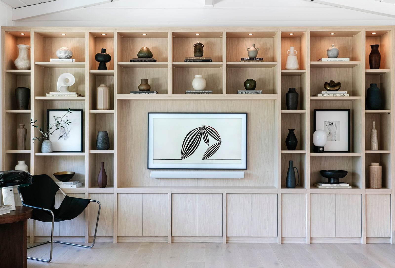 Walk in closet designed for Interior Designer Anne Sage by California Closets