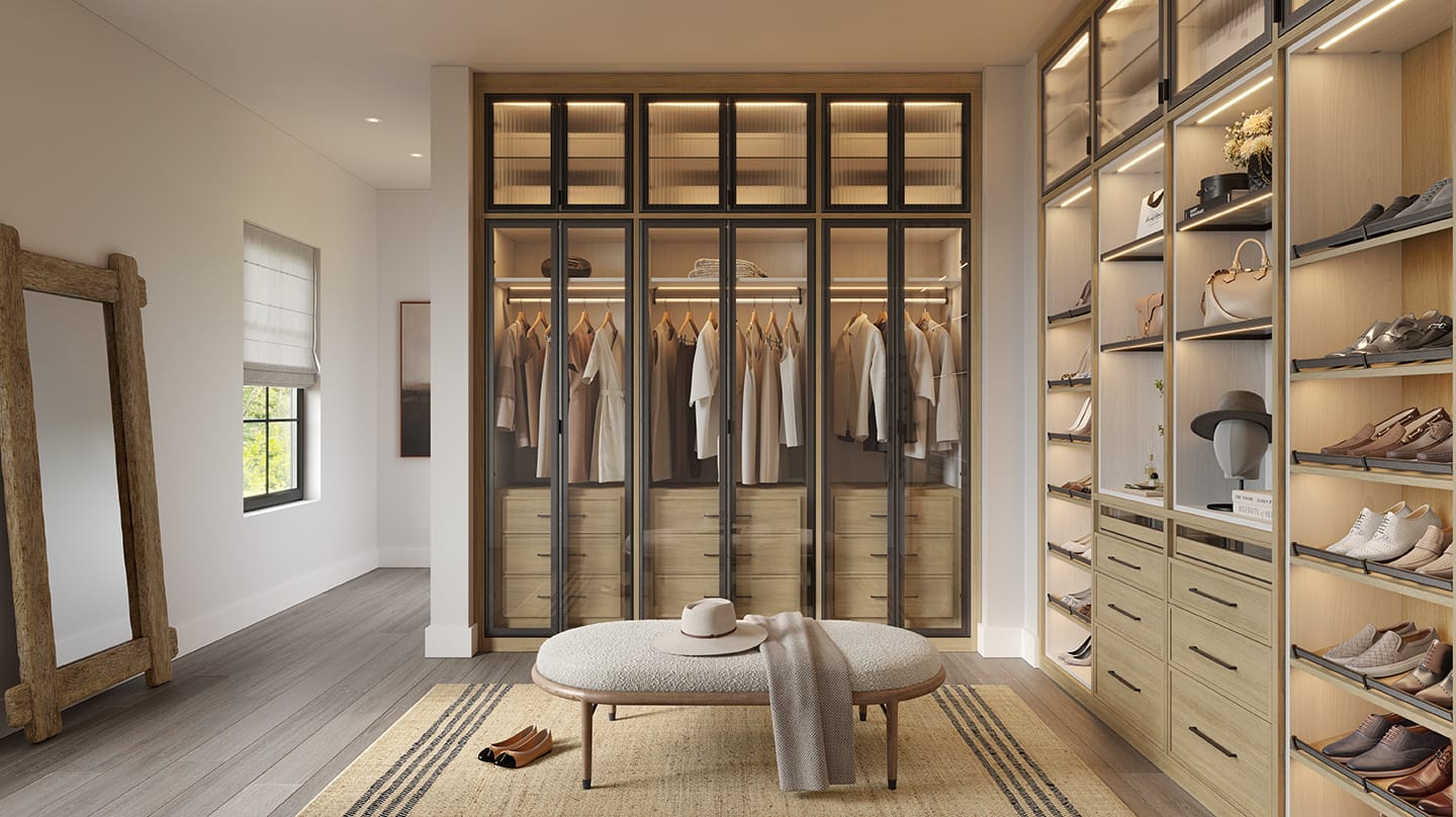 Walk-in closet customized with drawers and shelves storage and LED lighting by California Closets